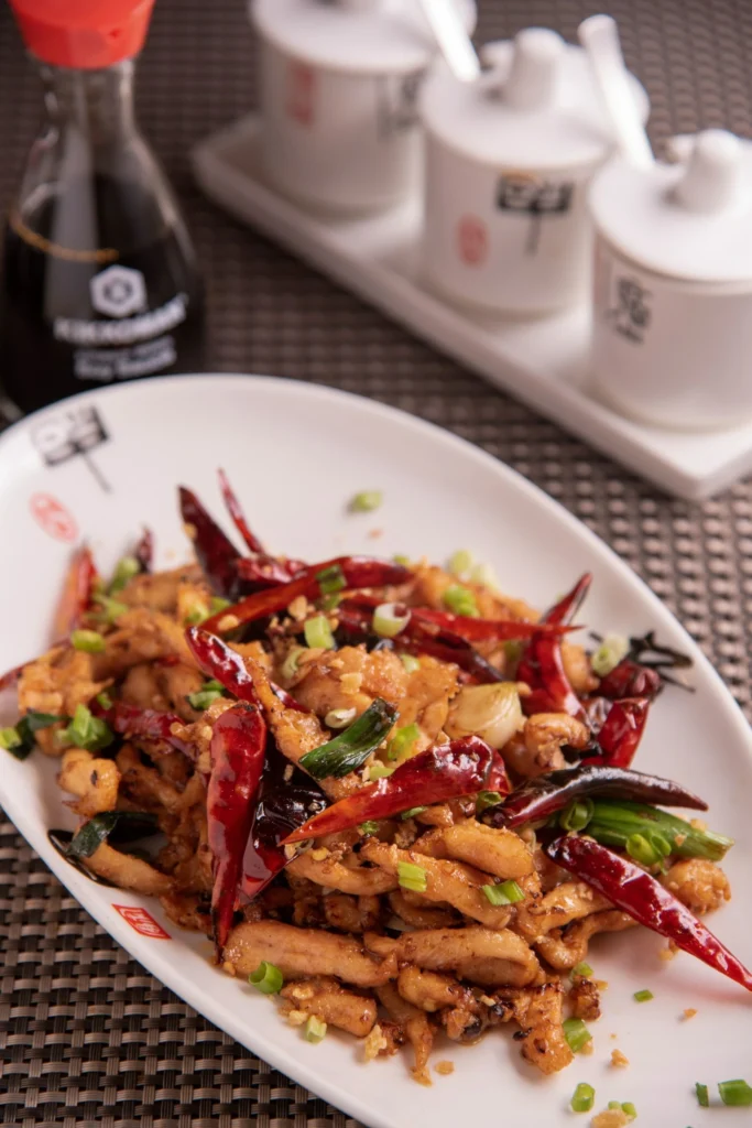 Shredded Chicken with Dry Red Chilli served at Berco's prepared with Kikkoman Soy Sauce. Uae Kikkoman for Tastier Chinese Food